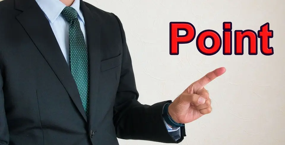Pointの文字を指さすビジネスマン