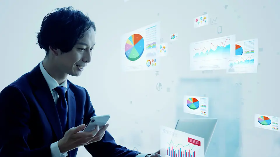 PCとビジネスマン・表グラフ